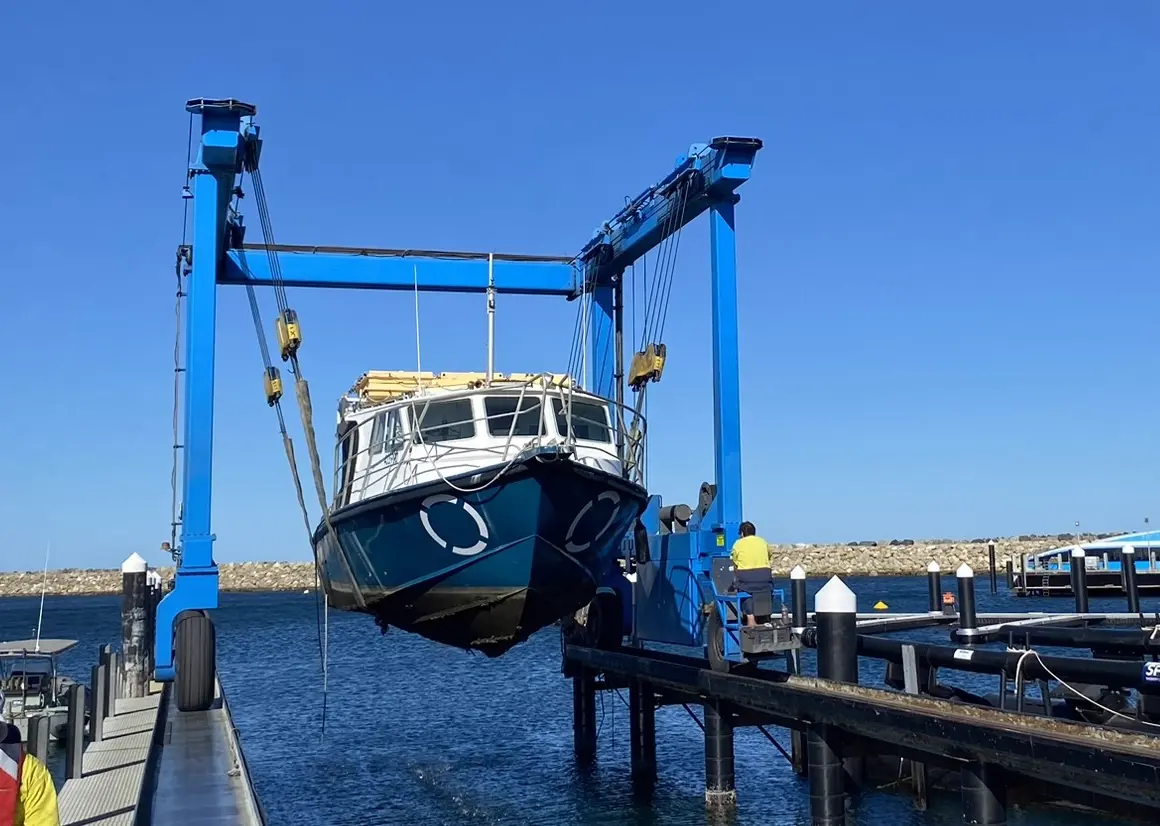 A ship being brought into a dry dock.